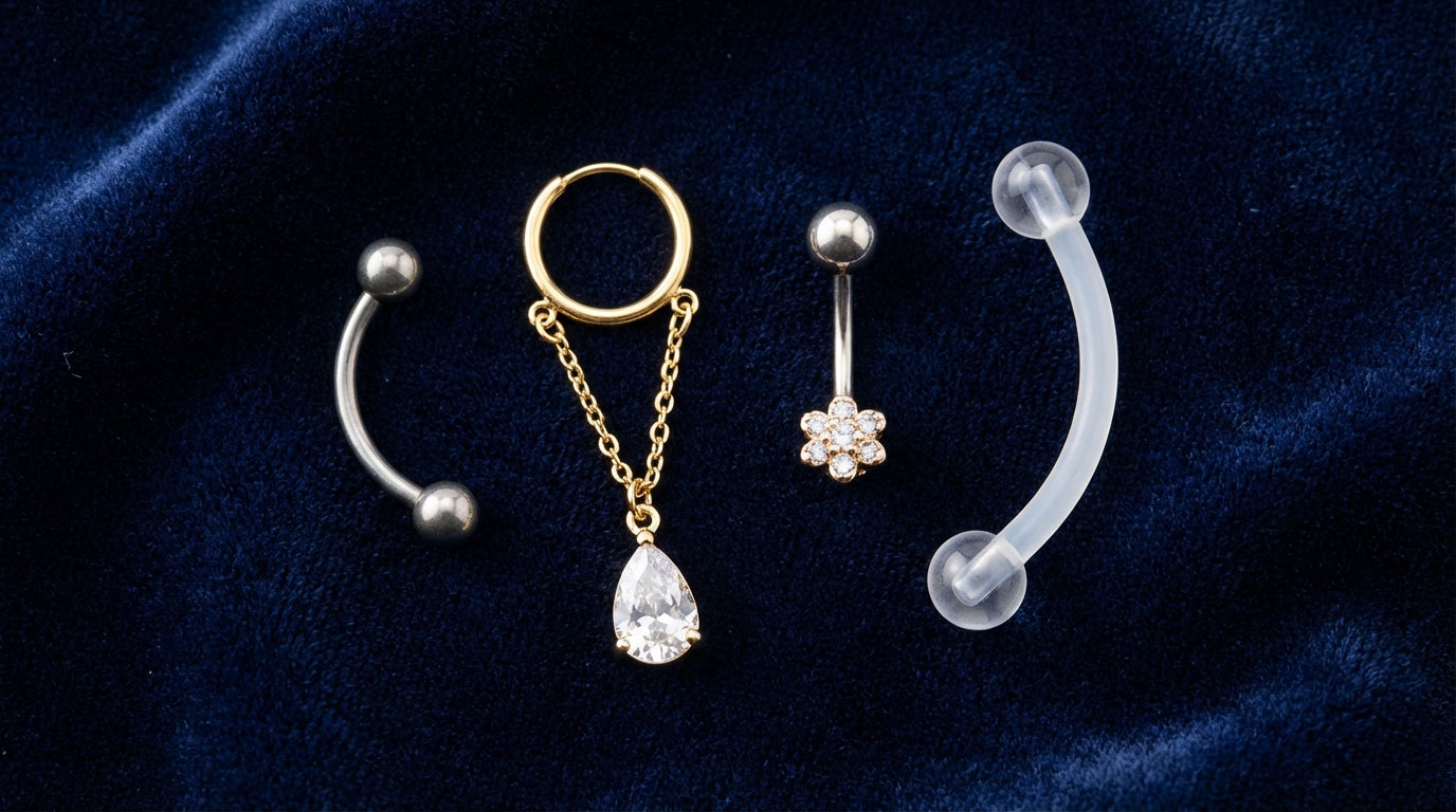 Woman's belly button navel piercing with gold curved barbell — complete navel piercing guide 2025 showing standard upper rim placement